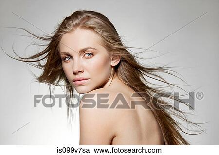 Woman with windswept long hair View Large Photo Image Stock Image - Woman with windswept long hair. Fotosearch