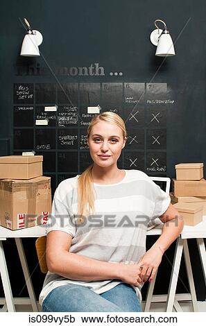 Woman working from home View Large Photo Image Stock Image - Woman working from home. Fotosearch
