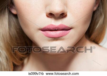 Stock Image - Womans face, close up of mouth. Fotosearch