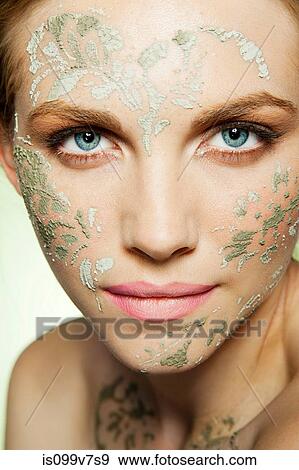 Womans face decorated with face mask View Large Photo Image Stock Photo - Womans face decorated with face mask. Fotosearch