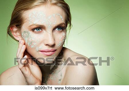 Womans face decorated with face mask View Large Photo Image Stock Photograph - Womans face decorated with face mask. Fotosearch