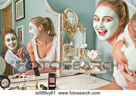 Women in face masks View Large Photo Image Stock Image - Women in face masks. Fotosearch
