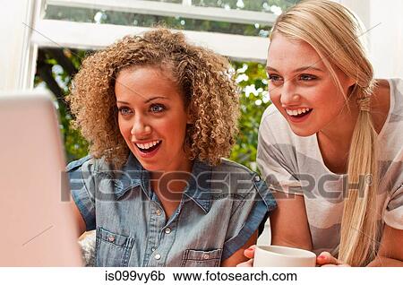 Women using laptop View Large Photo Image Stock Image - Women using laptop. Fotosearch