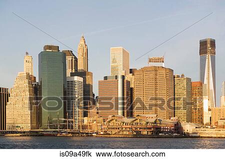 City skyline on waterfront View Large Photo Image Stock Image - City skyline on waterfront. Fotosearch