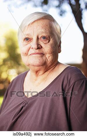Stock Image - Close up of older woman's face. Fotosearch