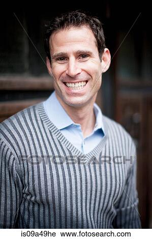 Close up of smiling man's face View Large Photo Image Stock Image - Close up of smiling man's face. Fotosearch