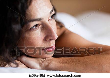 Close up of woman's serious face View Large Photo Image Stock Image - Close up of woman's serious face. Fotosearch