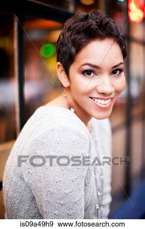 Stock Photo - Close up of woman's smiling face. Fotosearch
