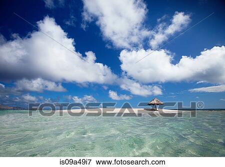 Clouds over sandbar and tropical water View Large Photo Image Stock Photo - Clouds over sandbar and tropical water. Fotosearch