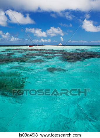 Clouds over sandbar and tropical water View Large Photo Image Stock Photo - Clouds over sandbar and tropical water. Fotosearch