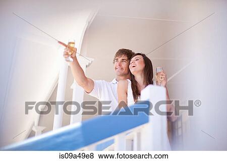 Stock Photo - Couple admiring scenery together. Fotosearch