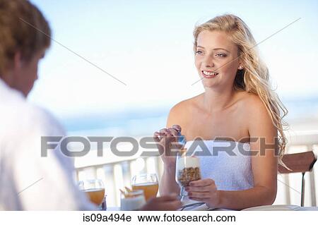Couple eating breakfast together View Large Photo Image Stock Image - Couple eating breakfast together. Fotosearch