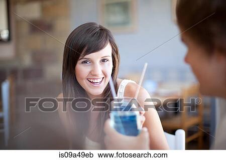 Couple toasting with cocktails View Large Photo Image Stock Image - Couple toasting with cocktails. Fotosearch