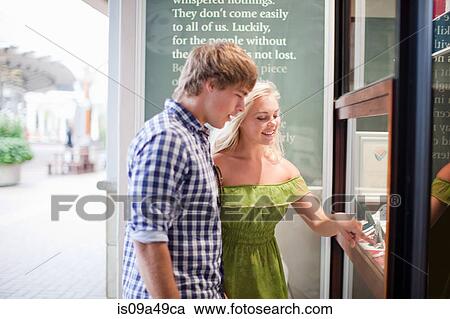 Couple window shopping for jewelry View Large Photo Image Stock Image - Couple window shopping for jewelry. Fotosearch
