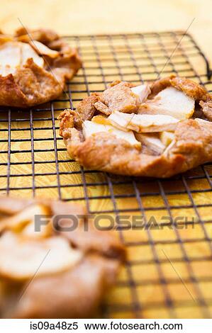Fruit tarts on cooling rack View Large Photo Image Stock Photography - Fruit tarts on cooling rack. Fotosearch