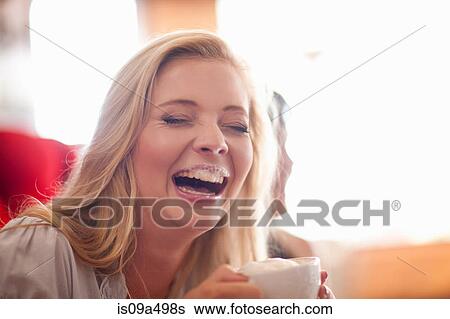 Laughing woman with milk mustache View Large Photo Image Stock Photograph - Laughing woman with milk mustache. Fotosearch