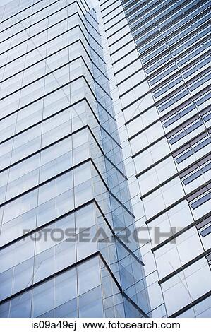 Stock Image - Low angle view of urban skyscraper. Fotosearch