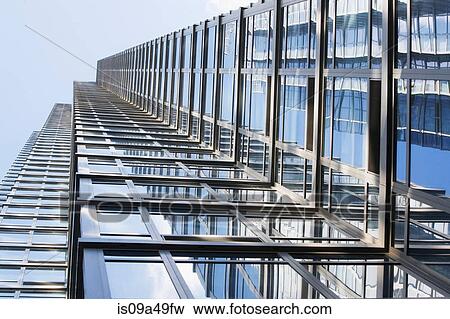 Stock Photo - Low angle view of urban skyscraper. Fotosearch