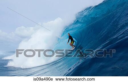 Man surfing in curl of wave View Large Photo Image Stock Image - Man surfing in curl of wave. Fotosearch