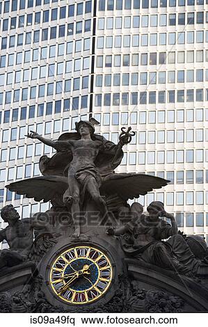 Stock Photography - Ornate sculpture on clock tower. Fotosearch