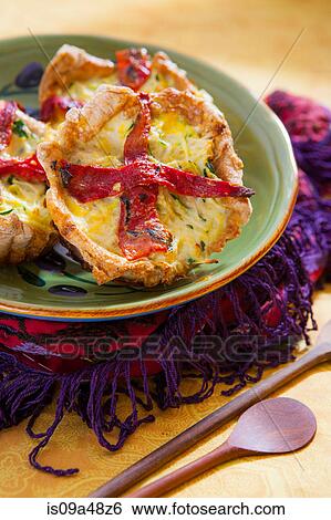 Plate of quiches on placemat View Large Photo Image Stock Photograph - Plate of quiches on placemat. Fotosearch