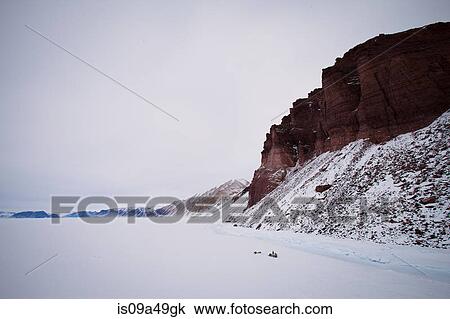 Red cliffs in snowy landscape View Large Photo Image Stock Image - Red cliffs in snowy landscape. Fotosearch