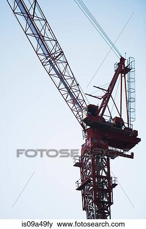 Silhouette of crane against sky View Large Photo Image Stock Photo - Silhouette of crane against sky. Fotosearch