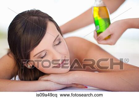 Smiling woman having massage View Large Photo Image Stock Photography - Smiling woman having massage. Fotosearch