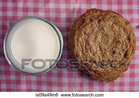 Stack of chocolate chip cookies and milk View Large Photo Image Stock Photograph - Stack of chocolate chip cookies and milk. Fotosearch