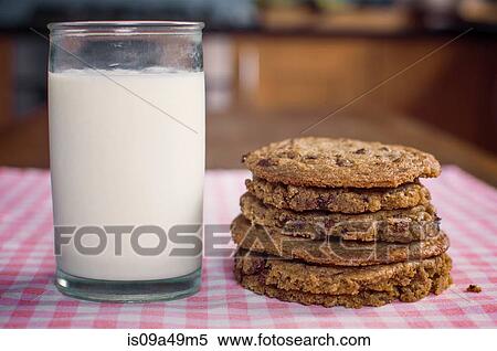 Stack of chocolate chip cookies and milk View Large Photo Image Stock Photography - Stack of chocolate chip cookies and milk. Fotosearch