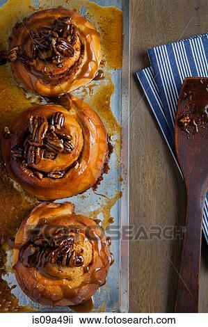 Sticky buns on cooking tray View Large Photo Image Stock Image - Sticky buns on cooking tray. Fotosearch