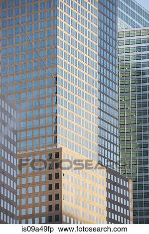 Stock Photography - Urban skyscrapers on city street. Fotosearch