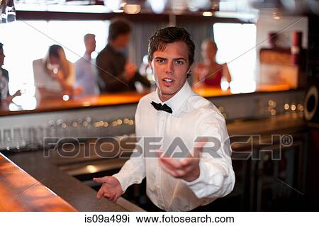 Waiter taking order at restaurant bar View Large Photo Image Stock Image - Waiter taking order at restaurant bar. Fotosearch