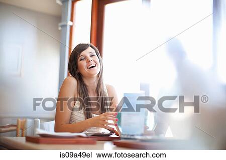 Woman having cocktail in restaurant View Large Photo Image Stock Image - Woman having cocktail in restaurant. Fotosearch