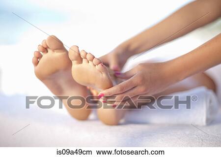 Picture - Woman having foot massage. Fotosearch