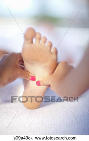 Woman having foot massage View Large Photo Image Stock Image - Woman having foot massage. Fotosearch