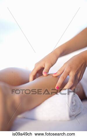 Woman having leg massage View Large Photo Image Stock Image - Woman having leg massage. Fotosearch