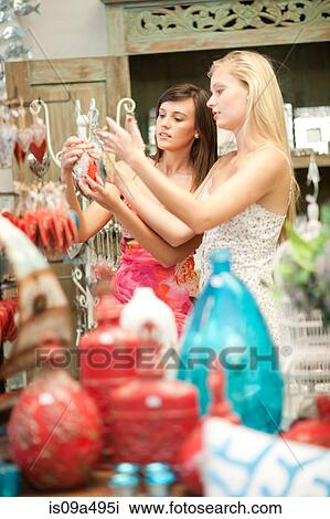Woman shopping together in store View Large Photo Image Stock Image - Woman shopping together in store. Fotosearch