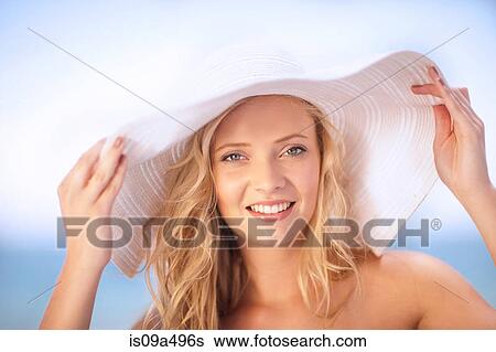 Woman wearing floppy hat outdoors View Large Photo Image Stock Photograph - Woman wearing floppy hat outdoors. Fotosearch