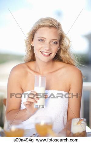 Woman with milk mustache at breakfast View Large Photo Image Stock Image - Woman with milk mustache at breakfast. Fotosearch