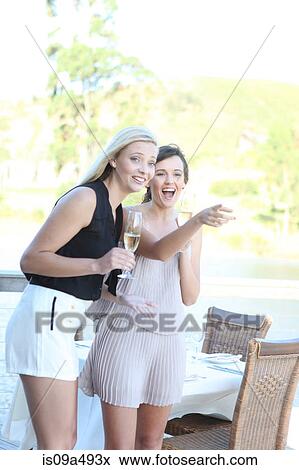 Women admiring scenery outdoors View Large Photo Image Stock Photo - Women admiring scenery outdoors. Fotosearch