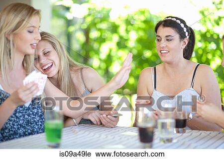 Women playing cards at table View Large Photo Image Stock Image - Women playing cards at table. Fotosearch