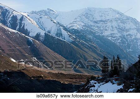 Aerial view of snowy mountain valley View Large Photo Image Stock Photo - Aerial view of snowy mountain valley. Fotosearch