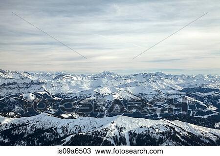 Aerial view of snowy mountains View Large Photo Image Stock Image - Aerial view of snowy mountains. Fotosearch
