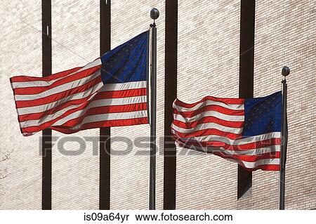 American flags flying by skyscraper View Large Photo Image Stock Photography - American flags flying by skyscraper. Fotosearch