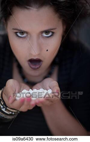 Angry teenage girl holding pills View Large Photo Image Stock Image - Angry teenage girl holding pills. Fotosearch