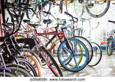 Stock Photo - Bicycles for sale in shop. Fotosearch