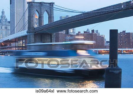 Blurred view of boat on urban river View Large Photo Image Stock Image - Blurred view of boat on urban river. Fotosearch