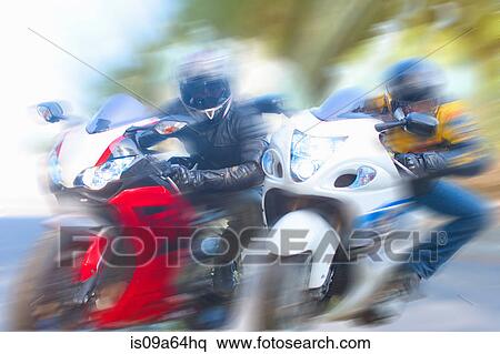 Blurred view of men riding motorcycles View Large Photo Image Stock Photography - Blurred view of men riding motorcycles. Fotosearch