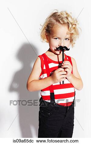 Stock Image - Boy wearing mime costume. Fotosearch